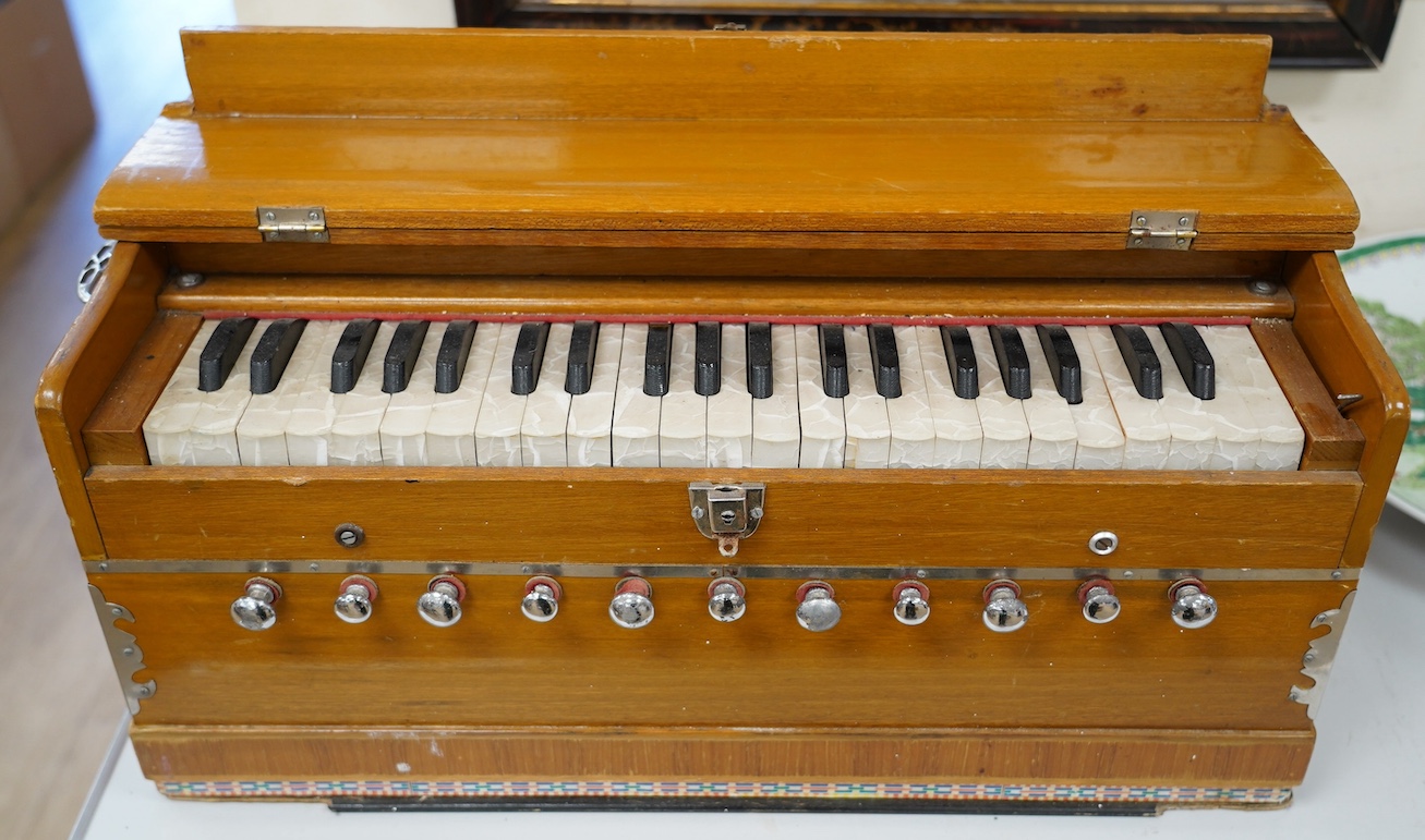 A 1960's chrome-mounted accordion, 60cm wide x 27.5cm high. Condition - poor to fair